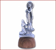 ST NG/012 STATUA B.AD. MEDJUGORIE BASE LEGNO ARG. H. 5 cm